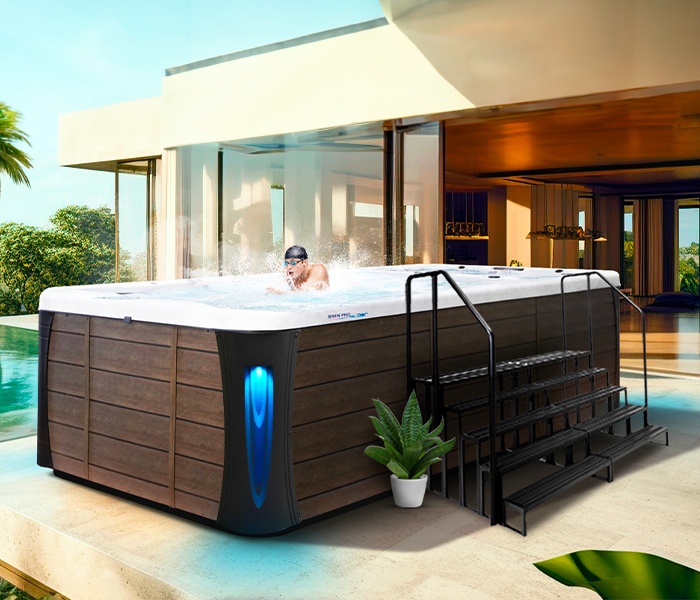 Calspas hot tub being used in a family setting - Peach Tree City
